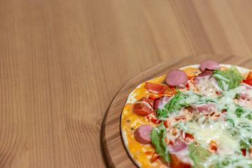 Delicious italian pizza served on wooden table