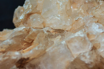 Gypsum lamellar habit or lamellar crystals of gypsum rock specimen from mining and quarrying industries. Gypsum is a soft sulfate mineral composed of calcium sulfate dihydrate.
