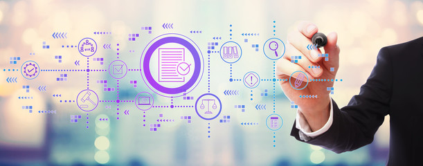 Compliance theme with businessman on blurred abstract background