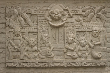 Beautiful white Java stucco patterned on the boundary wall. Vintage white wall bas-relief stucco in plaster, depicts Lotus flowers background.