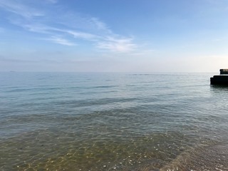 Obraz premium blue sky above the sea with clouds and sun in Odessa, Ukraine