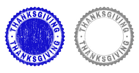 Grunge THANKSGIVING stamp seals isolated on a white background. Rosette seals with grunge texture in blue and grey colors. Vector rubber stamp imprint of THANKSGIVING title inside round rosette.