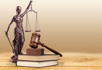 Justice Scales and books and wooden gavel on table. Justice concept