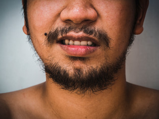 Obraz premium close up detail of male mouth have beard and mustache
