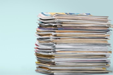 Laptop and black glasses  on   background.