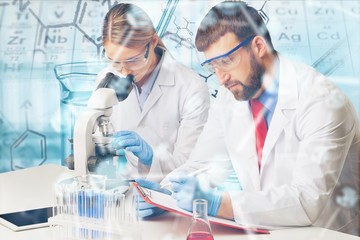 Two scientists conducting research in a lab environment