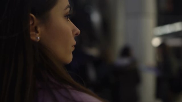 Young worried lady lost in subway during visit in unknown city, destination