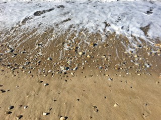 Fototapeta na wymiar Sand on a beach in Crete, Greece
