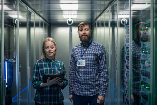 Technician works in a data center wearing a VR headset