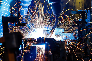 Welding robots in factory