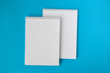 school notebook on blue background