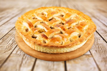 Freshly baked cake on white background