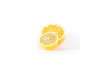 isolated lemon and orange on white