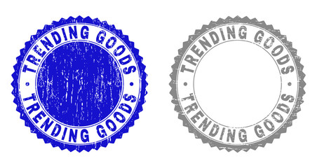 Grunge TRENDING GOODS stamp seals isolated on a white background. Rosette seals with grunge texture in blue and grey colors. Vector rubber stamp imprint of TRENDING GOODS title inside round rosette.