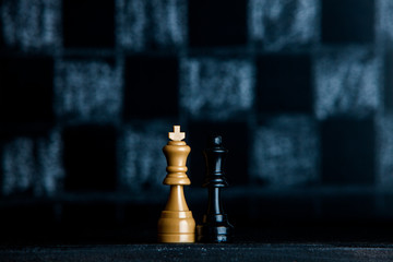 Chess board with chess pieces. Chess on the dark background. Business success concept. Strategy....
