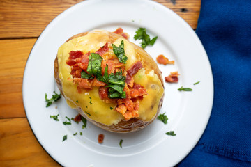 Baked potato with bacon and cheese