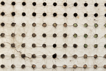 craquelure texture on a white wooden perforated plank