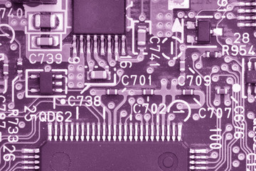 close-up of electronic circuit board with processor Toned image