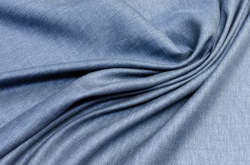 Fototapeta na wymiar Linen fabric with gray-blue silk