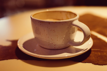 A cup of latte on a table
