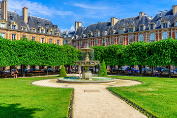 Place des Vosges (Place Royale) is the oldest planned square in Paris and one of the finest in the city. It is located in the Marais district in Paris, France - obrazy, fototapety, plakaty