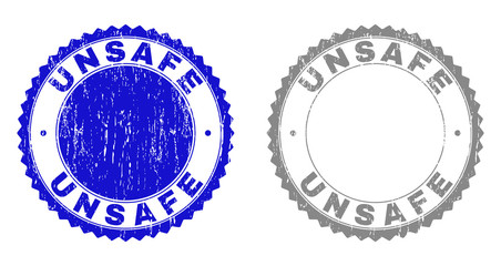 Grunge UNSAFE stamps isolated on a white background. Rosette seals with grunge texture in blue and grey colors. Vector rubber overlay of UNSAFE title inside round rosette.