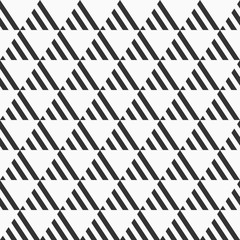 Naklejka premium Abstract seamless pattern. Repeating geometric tiles from striped bold triangles.