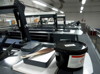 Press printing - Offset machine. Printing technique where the inked image is transferred from a plate to a rubber blanket, then to the printing surface.