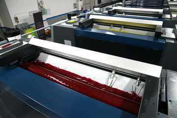 Press printing - Offset machine. Printing technique where the inked image is transferred from a...