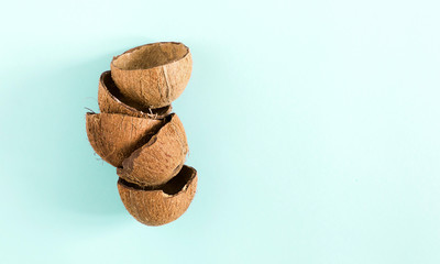 Summer minimal composition. Creative layout made of coconut on pastel blue background. Food concept. Flat lay, top view, copy space