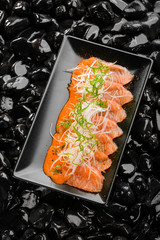 Salmon sashimi with daikon