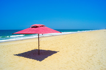 Obraz na płótnie Canvas Umbrella on the beach 