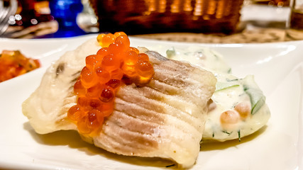 Cod fillet with salmon caviar sauce and Tartar sauce