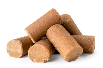 Heap of chocolate bars close up on a white. Isolated.