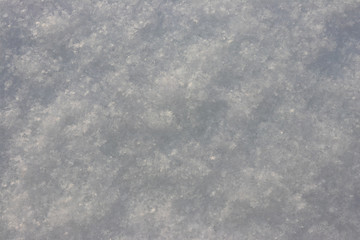 background. snow with prominent snowflakes. ice.