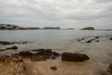 Fototapeta na wymiar The coast in Santa Eulalia a cloudy day, Ibiza