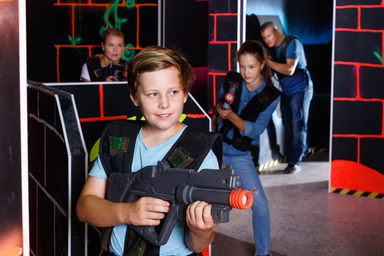 An Image Of A Young Boy Girl Team Playing Laser Tag Game Isolated