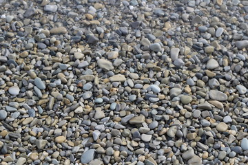 Texture of wet sea pebbles.