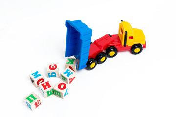 Toy truck and wooden cubes