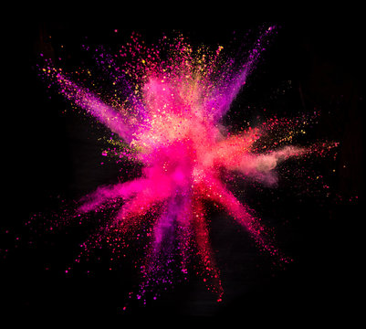 Explosion of colored powder on black background © Jag_cz