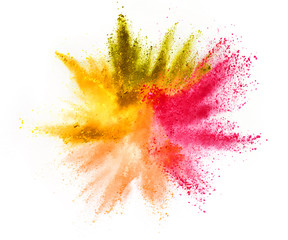 Multi colored powder explosion isolated on white