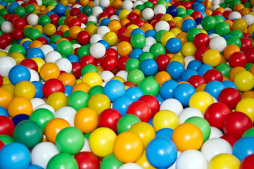 Fototapeta na wymiar Children multi colored balls for dry massage