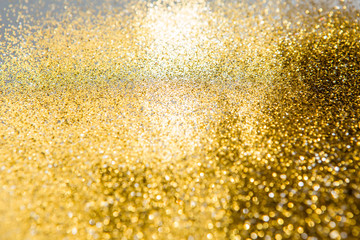 shiny texture background.Bokeh light, shimmering blur spot lights on multicolored abstract background.glitter vintage lights background. gold, silver, blue and black. de-focused.