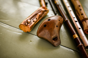 Different folk flutes from wood and steel © Lena May