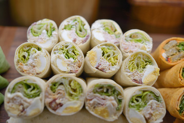 light lunch sliced wraps on the counter of the cafe