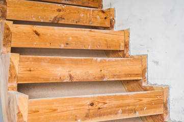 A wooden staircase in the construction process