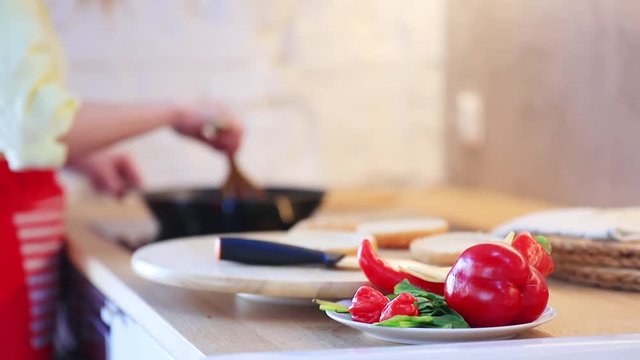 candind view at grilled mear and bun white cooking hamburger at home.