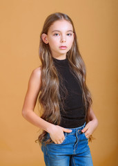 portrait of little model girl in studio