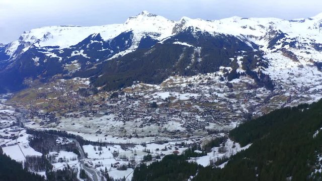 Aerial View, flight to Mittelhorn and Schreckhorn to Grindelwald in cloudy weather, Interlaken - Oberhasli, Canton of Bern, Switzerland