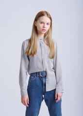 portrait of little model girl in studio